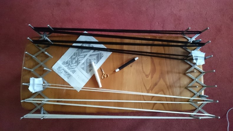 warp threads wound onto a board