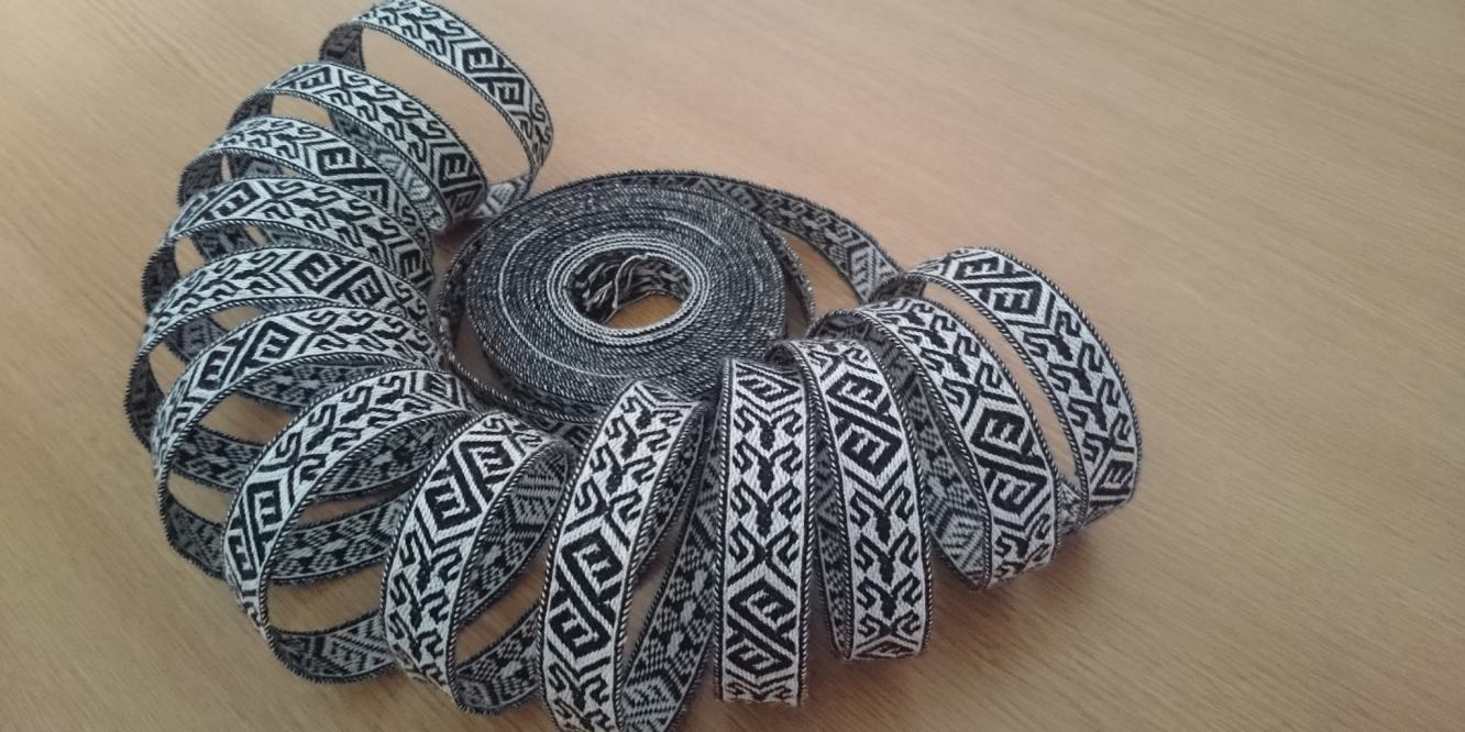 several metres of trim coiled into a shell shape.