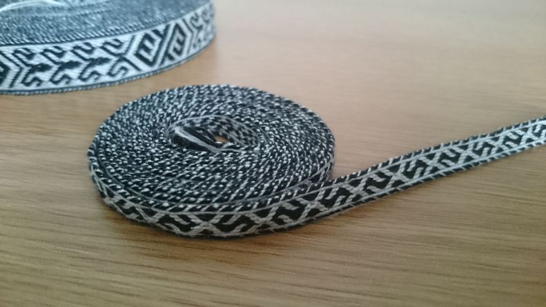 narrow trim in black and white thread